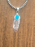 Sleeping Beauty Feather Pendant